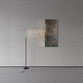 Contemporary Floor Lamp With Slim Metal Stand Illuminating Abstract Textured Wall Art