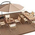 Outdoor Dining Table on Wooden Deck with Large Umbrella and Chairs Set with Plates