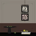 Beige And Brown Wall With Two Framed Abstract Artworks And Black Table With Green Fruits