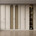 Modern Light Colored Wardrobe With Arched Doors Lattice Panels And Open Compartment Holding Bags