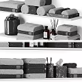 Modern Bathroom Accessories Collection Featuring Stacked Towels Aromatic Bottles Toothbrush Holders And Tissue Boxes
