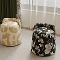 Decorative Sofa Stools With Beige Geometric And Black Floral Patterns On Carpet