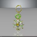 Elegant Golden Clothing Accessory Featuring Green Leaves Star Shaped Design And Central Gemstone