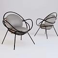 Two Modern Leisure Chairs With Curved Black Metal Frame And Gray Cushion