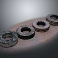 Old Worn Rusted Tires Arranged In A Row On Rusty Ground Surface 3d model