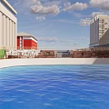 Red Multi Story Building With Circular Pool And Surrounding Structures Under Blue Sky