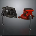 Two Black and Red Metal Bench Vices With Fixed Base Adjustable Jaws On Reflective Surface