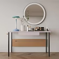 Modern Dressing Table with Round Mirror Blue Table Lamp and Skincare Products