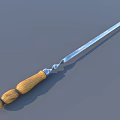 Grilled Juicy Marinated Meat Kebab on Metal Skewer with Wooden Handle