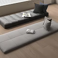 Modern Comfortable Floor Cushions in Gray and Dark Gray With Pillows Magazines On Wooden Floor