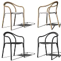 Modern Light Colored And Black Dining Chairs With Curved Armrests White And Black Seats