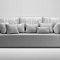 Three Seater Beige Sofa with Black Armrests and Orange Grey White Patterned Accent Pillows