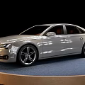 Silver Audi Luxury Sedan Displayed On Blue Platform With Black Background 3d model