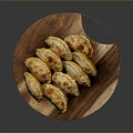 Freshly Cooked Crispy Golden Brown Fried Dumplings On Round Wooden Tray
