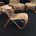 Modern Rattan Woven Leisure Chairs In Stylish Display With Dark Geometric Wall