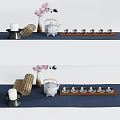 Traditional Tea Set With Teapot Cups Tray Scroll Candle And Vase On Blue Tablecloth