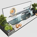 Modern Water Fountain with Flowing Water Green Plants Copper Lanterns and White Pebbles