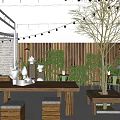 Outdoor Cafe With Wooden Structure String Lights White Sculptures Outdoor Seating And Green Plants