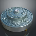 Silver Circular Sculpture Carving With Intricate Braided Patterns Central Pearl And Small Dot Decorations