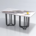 Modern Marble Dining Table with Black Metal Legs and White Plate Holding Yellow Fruit