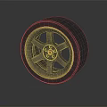 Stylish Tire with Golden Five Spoke Rim Red Center and Tread Pattern on Dark Background
