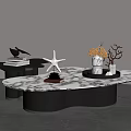 Modern Irregular Shape Coffee Table With Marble Top Black Base And Decorative Starfish Flowers Tray