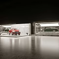 Modern Car Showroom Featuring Red Vehicle On Display Platform And Glass Showcases