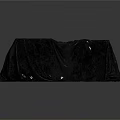 Mysterious Long Object Covered With Dark Draped Fabric On Gray Background