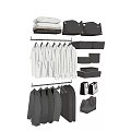 Organized Wardrobe With Hanging White T-Shirts Dark Sweaters Storage Boxes And Handbags