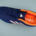 Navy Blue Soccer Shoes With Orange Tongue White Stripes And Blue Traction Outsole