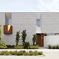 Modern Single Family Home With Gray Facade Windows And Wooden Fence Landscaping