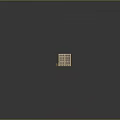 Multi Story Yellow Brick Urban Building With Black Roof Windows And Street Side Storefronts