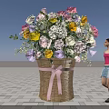 Large Woven Basket Floral Installation With Colorful Flowers And Pink Ribbon Bow In Outdoor Setting