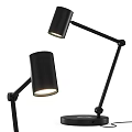 Two Black Desk Lamps With Adjustable Arms And Cylindrical Illuminated Shades