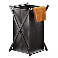 Black Metal X Shaped Laundry Hamper With Orange Towel And Storage Bag