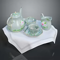 Porcelain Tea Set With Pink Floral Design Teapot Creamer Cup Saucer On White Napkin