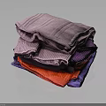 Stacked Colorful Textured Towels In Various Hues Purple Red And Blue