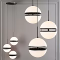 Modern Spherical Pendant Lights With White Shades And Black Metal Frames For Contemporary Interior Spaces