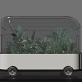 Modern Transparent Mobile Plant Container Structure With Lush Green Plants And Wheels