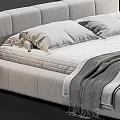 Modern Double Bed With Upholstered Headboard Soft Pillows And Striped Bedding With Knitted Blanket