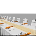 Elegant Banquet Table Setup With White Tablecloth Yellow Sashes And White Chairs