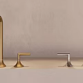 Stylish Faucets with Different Finishes on Light Gray Countertop and Beige Wall