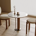 Modern Round Negotiation Table And Chairs With Beige Cushions Wooden Legs Vase And Window Blinds
