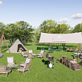 Camping Site With Tents Canopy Wooden Furniture Grill And Natural Surroundings