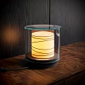 Modern Table Lamp With Transparent Glass Shade Yellow Lampshade Black Spiral Lines On Wooden Table