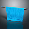Blue Soft Towel Hanging On Metal Rod For Daily Household Use