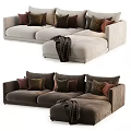 Beige And Brown L Shaped Sectional Sofa With Multiple Patterned Cushions And Cozy Blanket 3d model