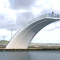 Scenic White Curved Observation Deck With Glass Railing Over Water And Standing Person
