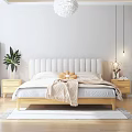 Modern Double Bed With White Upholstered Headboard Wooden Frame Nightstands Green Plant And Star Lamp