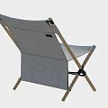 Outdoor Table Setup With Folding Chairs Orange Umbrella And Wooden Crate